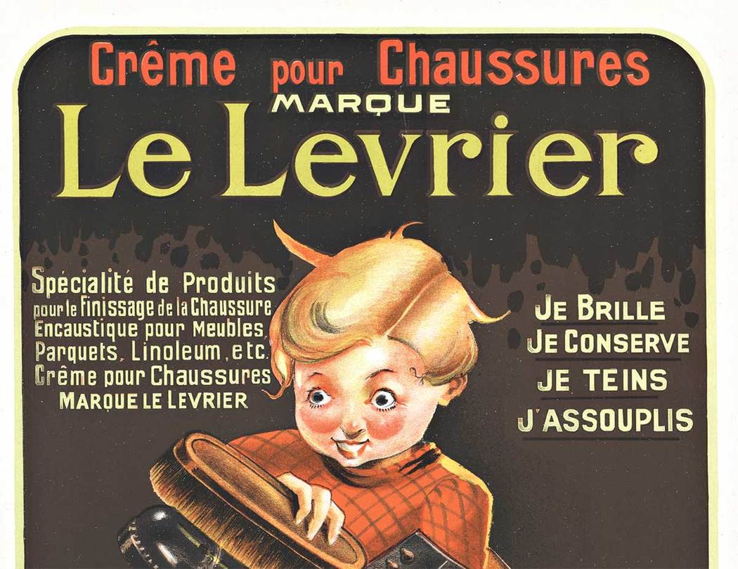 Le Levrier an ad for shoe shine polish has this girl buffing boots