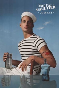 You man dressed to be a saiilor to sell Jean Paul Gautier cologne.   Linen backed   Small stain on bottom of linen that would be trimmed or covered during framing.